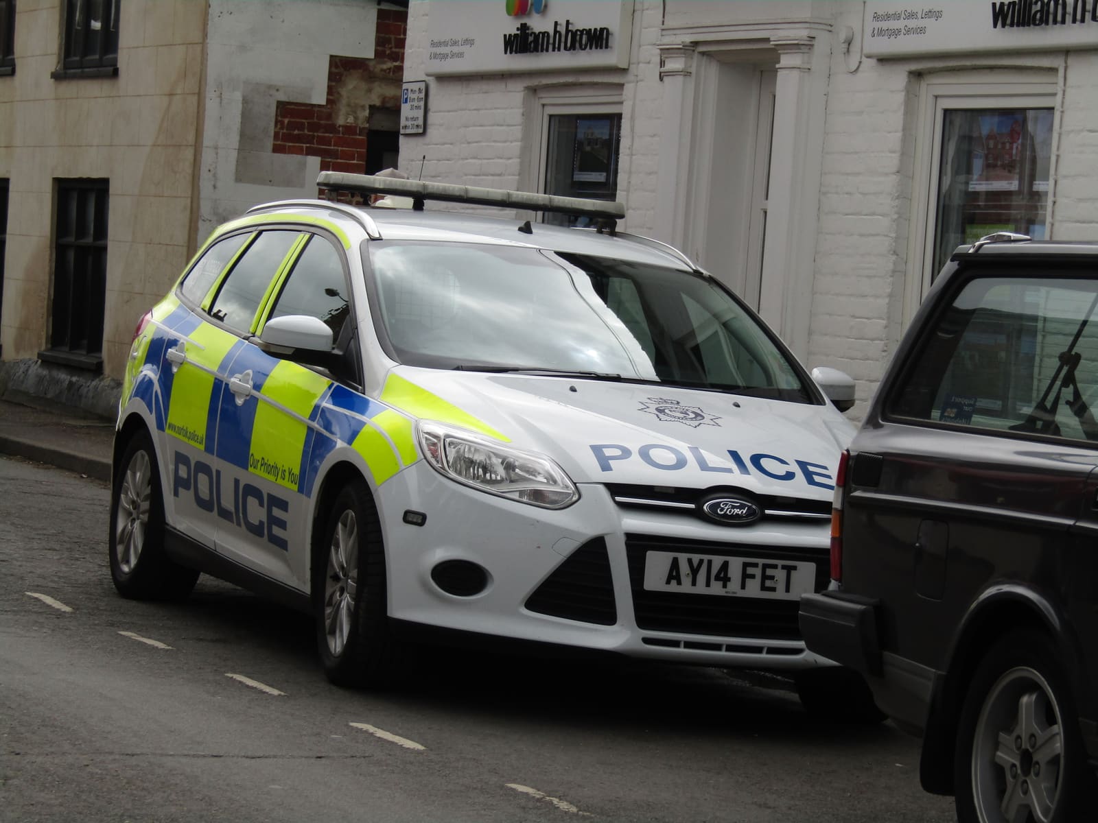 A police car on an English high street