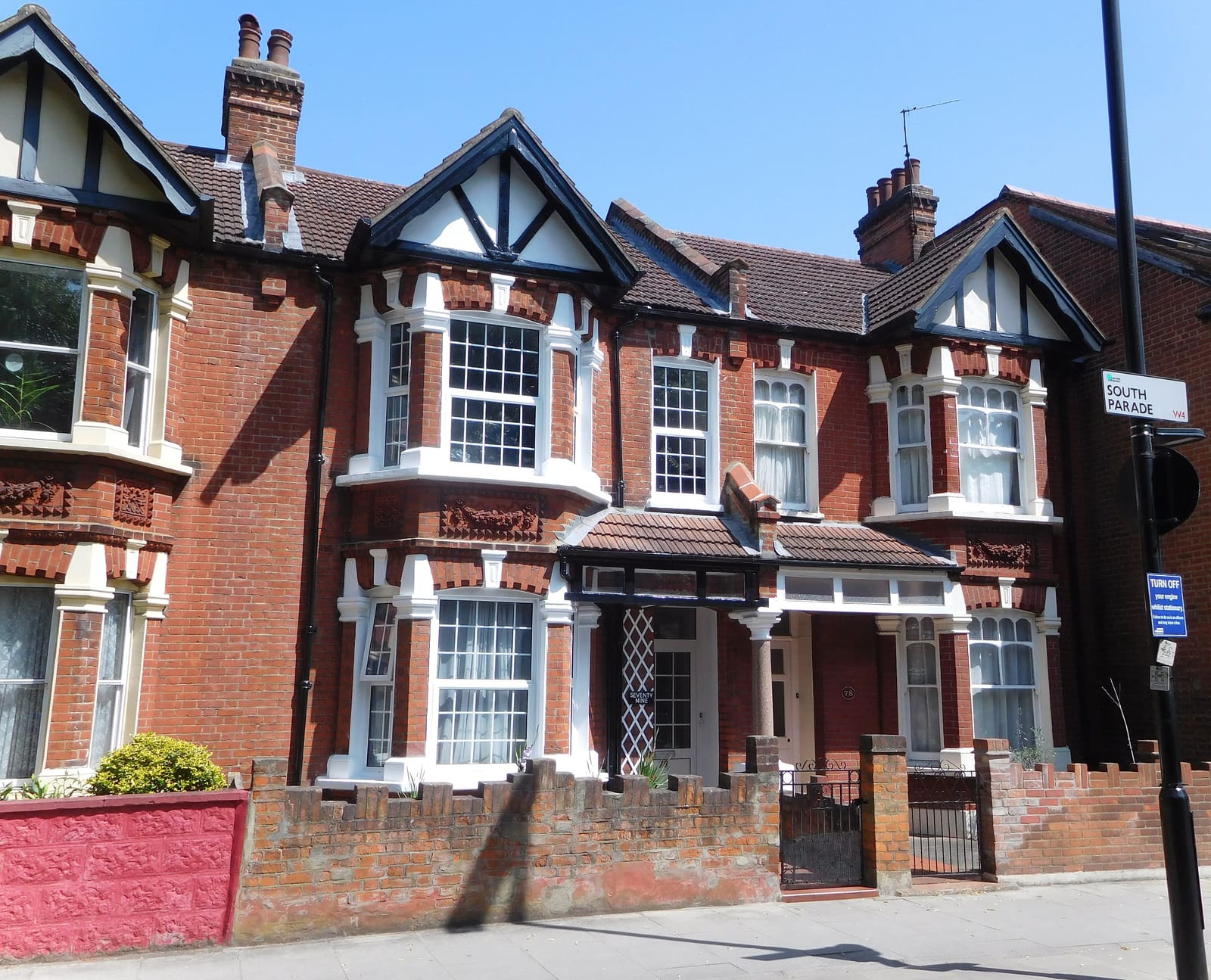 Edwardian red-brick terraced houses on South Parade, Acton Green, London